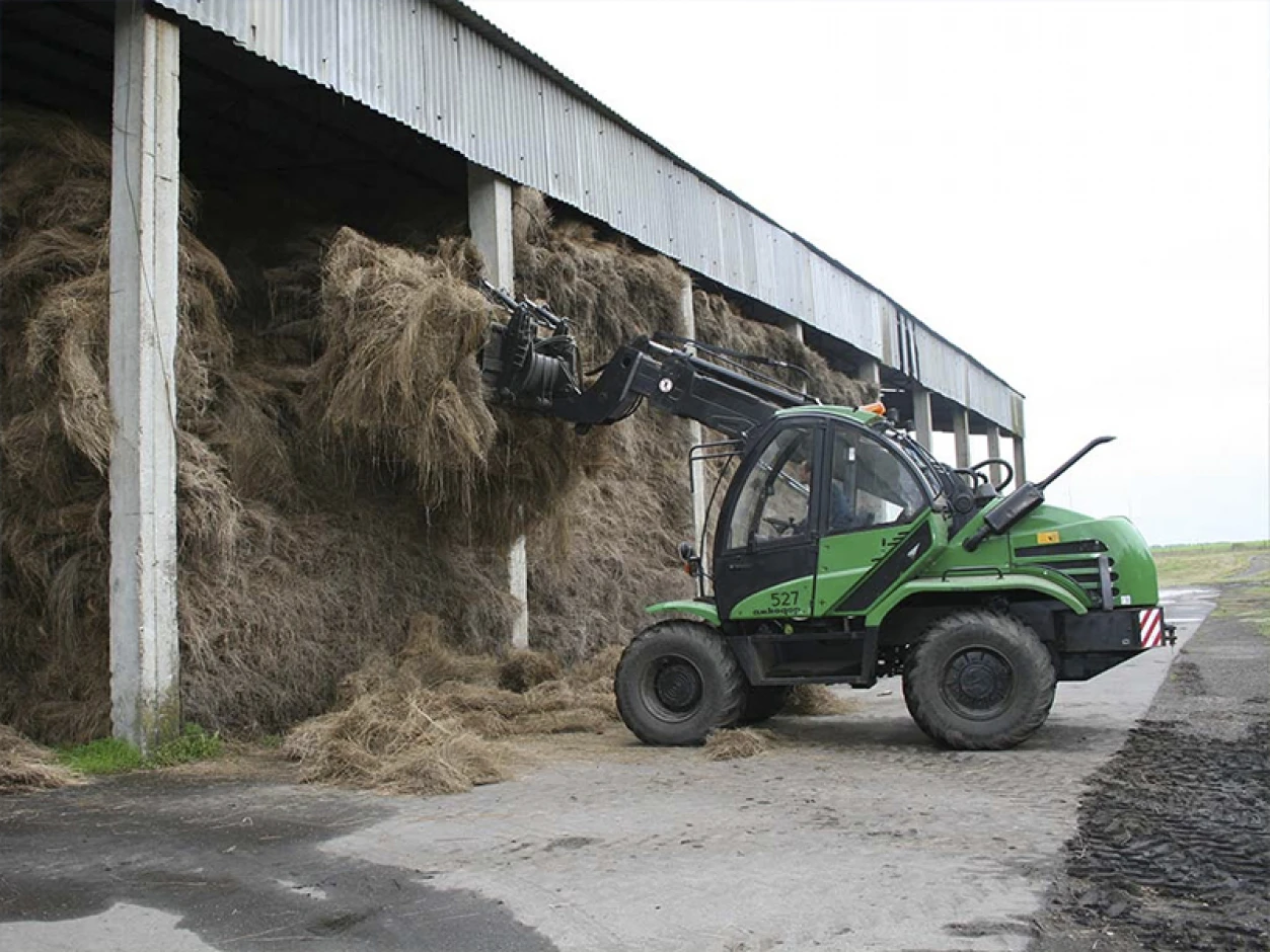 Universal loader with a telescopic boom. - 1 Universal loader with a telescopic boom. #1